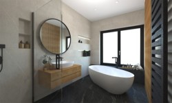 Moderná kúpeľňa s voľne stojacou vaňou, okrúhlym zrkadlom v čenom ráme, svetlé obklady a tmavá dlažba